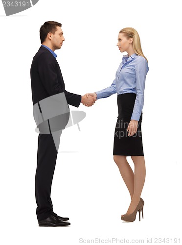 Image of man and woman shaking their hands