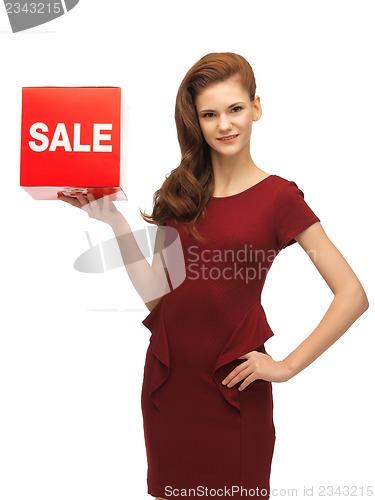 Image of teenage girl in red dress with sale sign