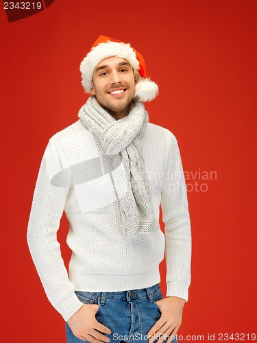 Image of handsome man in christmas hat