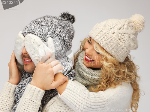 Image of family couple in a winter clothes