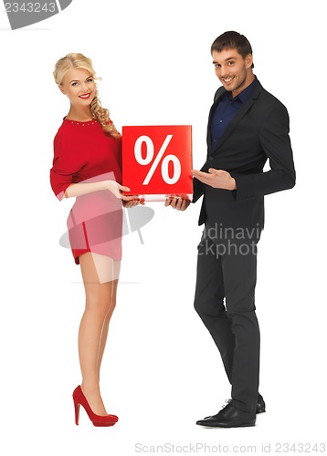 Image of man and woman with percent sign