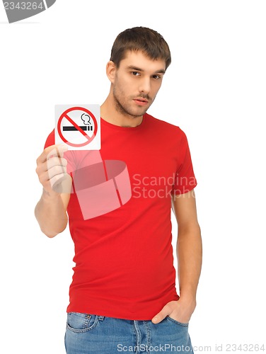 Image of man in red shirt with no smoking sign