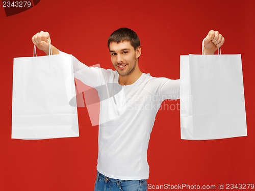 Image of man with shopping bags