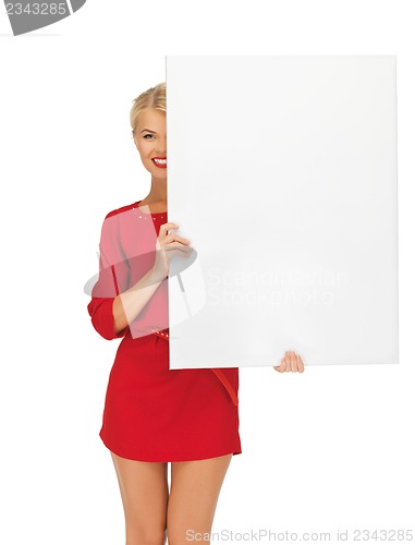 Image of lovely woman in red dress with blank board