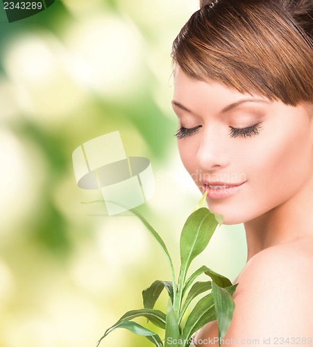 Image of woman with sprout