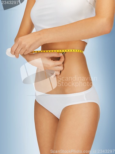 Image of woman with measure tape