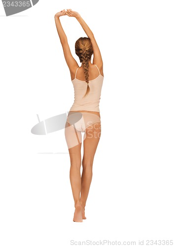 Image of rear view of beautiful woman in cotton undrewear