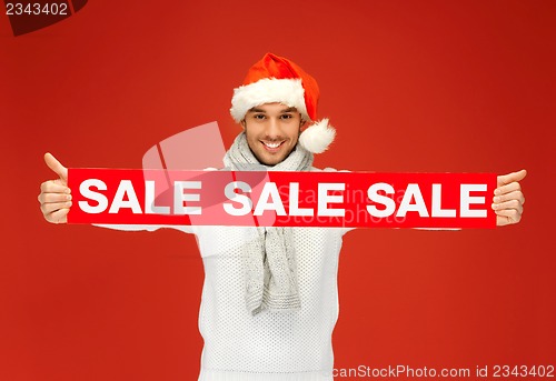 Image of handsome man in christmas hat