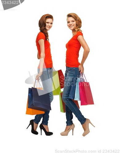Image of two teenage girls with shopping bags