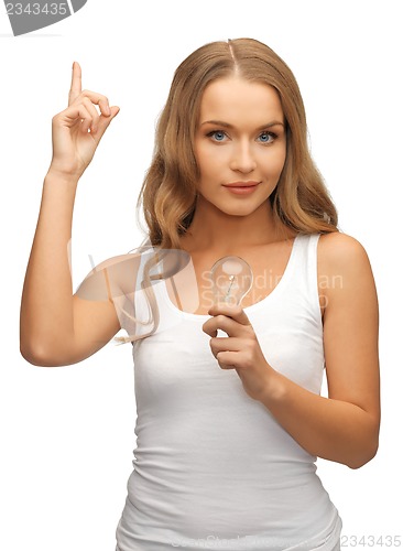 Image of woman with energy saving bulb