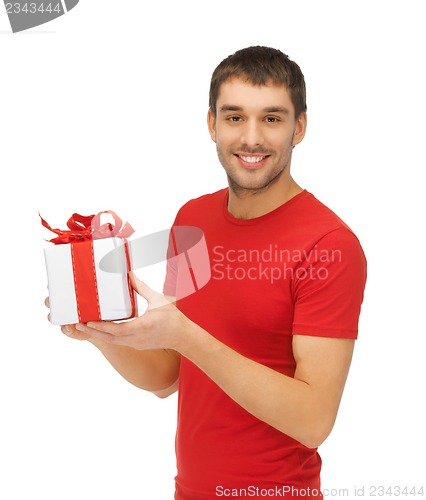 Image of handsome man with a gift