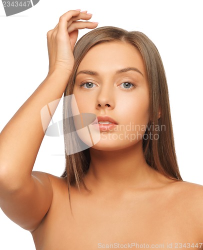 Image of worried woman with long hair