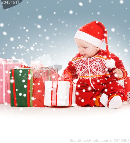 Image of santa helper baby with christmas gifts