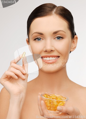 Image of woman with vitamins