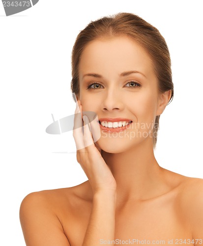 Image of face and hands of beautiful woman