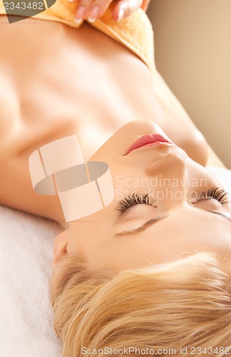 Image of beautiful woman in spa salon