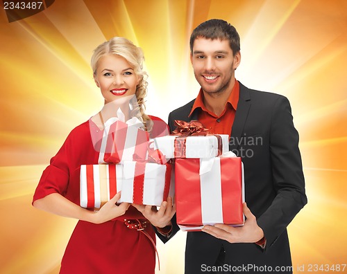 Image of man and woman with gift boxes