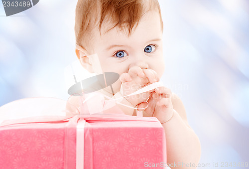 Image of baby boy with gift box