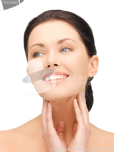 Image of face and hands of beautiful woman