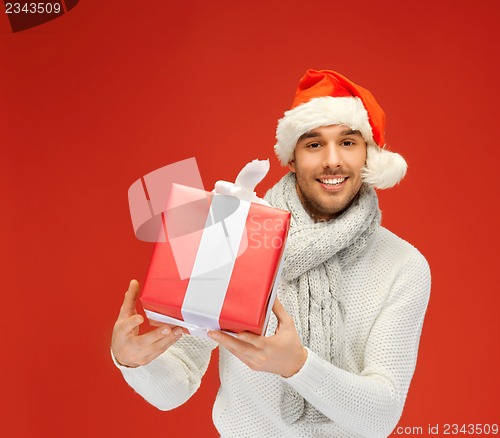 Image of handsome man in christmas hat