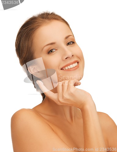Image of beautiful woman with moisturizing creme drop