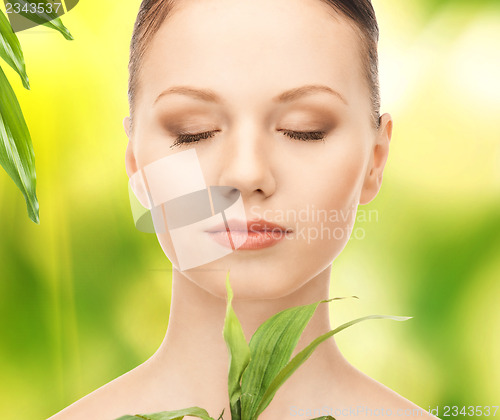 Image of woman with sprout