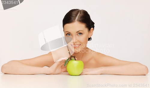 Image of woman with green apple