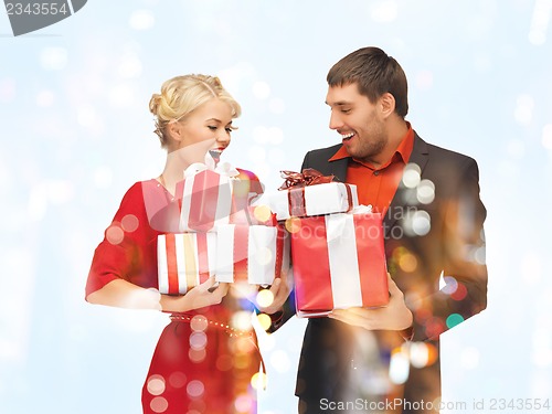 Image of man and woman with gift boxes