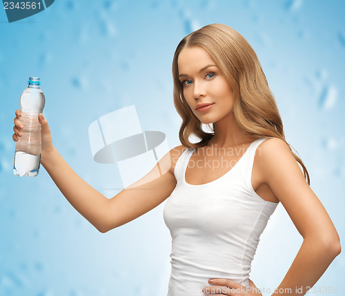 Image of young beautiful woman with  bottle of water