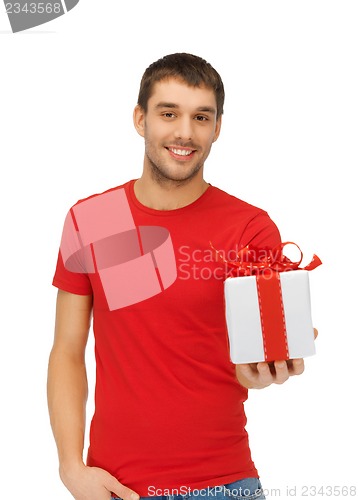 Image of handsome man with a gift