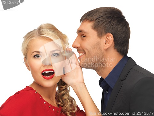 Image of man and woman spreading gossip