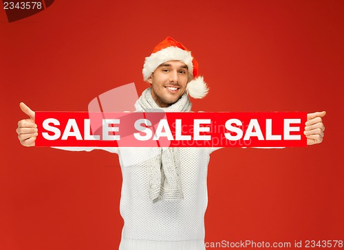 Image of handsome man in christmas hat