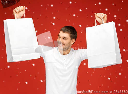 Image of man with shopping bags