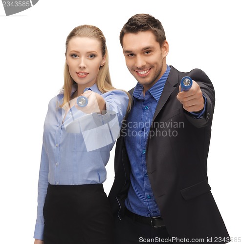 Image of man and woman with flashlights