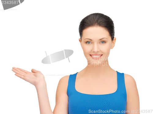 Image of woman holding something on the palm