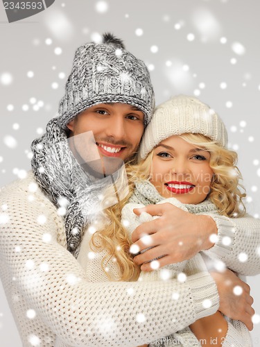 Image of family couple in a winter clothes