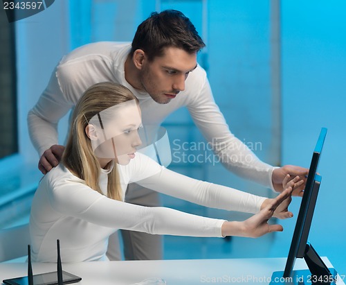 Image of man and woman in laboratory