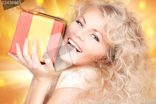 Image of happy girl with gift box