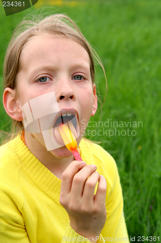 Image of Licking yellow ice-cream
