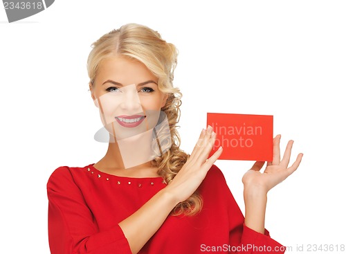 Image of lovely woman in red dress with note card