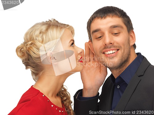 Image of man and woman spreading gossip