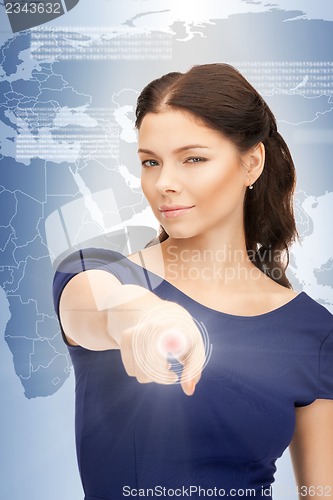 Image of businesswoman working with touch screen