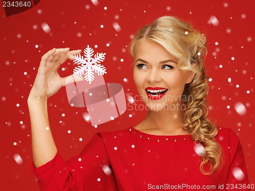 Image of lovely woman in red dress with snowflake