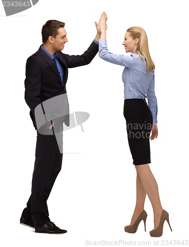 Image of man and woman giving a high five