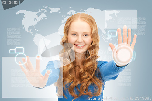 Image of businesswoman working with touch screen