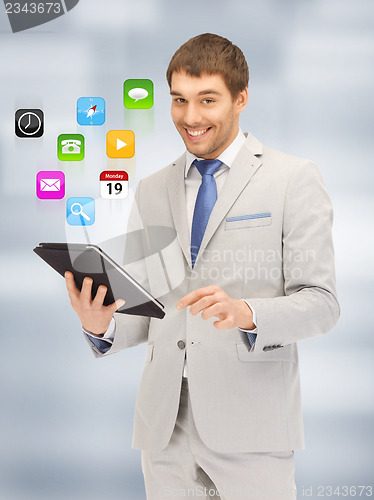 Image of happy man with tablet pc computer