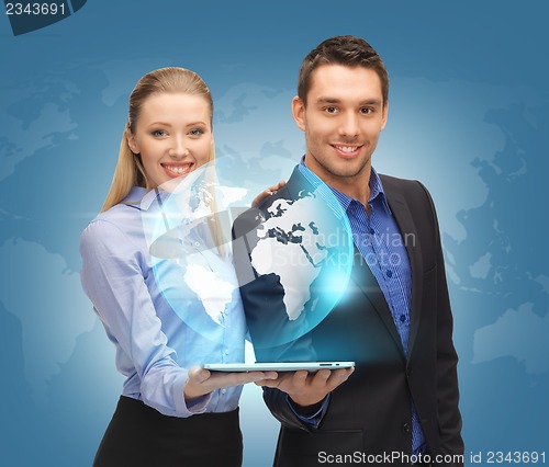 Image of man and woman with tablet pc and virtual globe