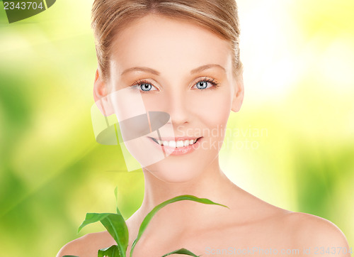 Image of woman with sprout