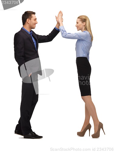 Image of man and woman giving a high five