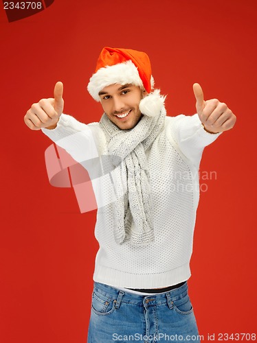 Image of handsome man in christmas hat